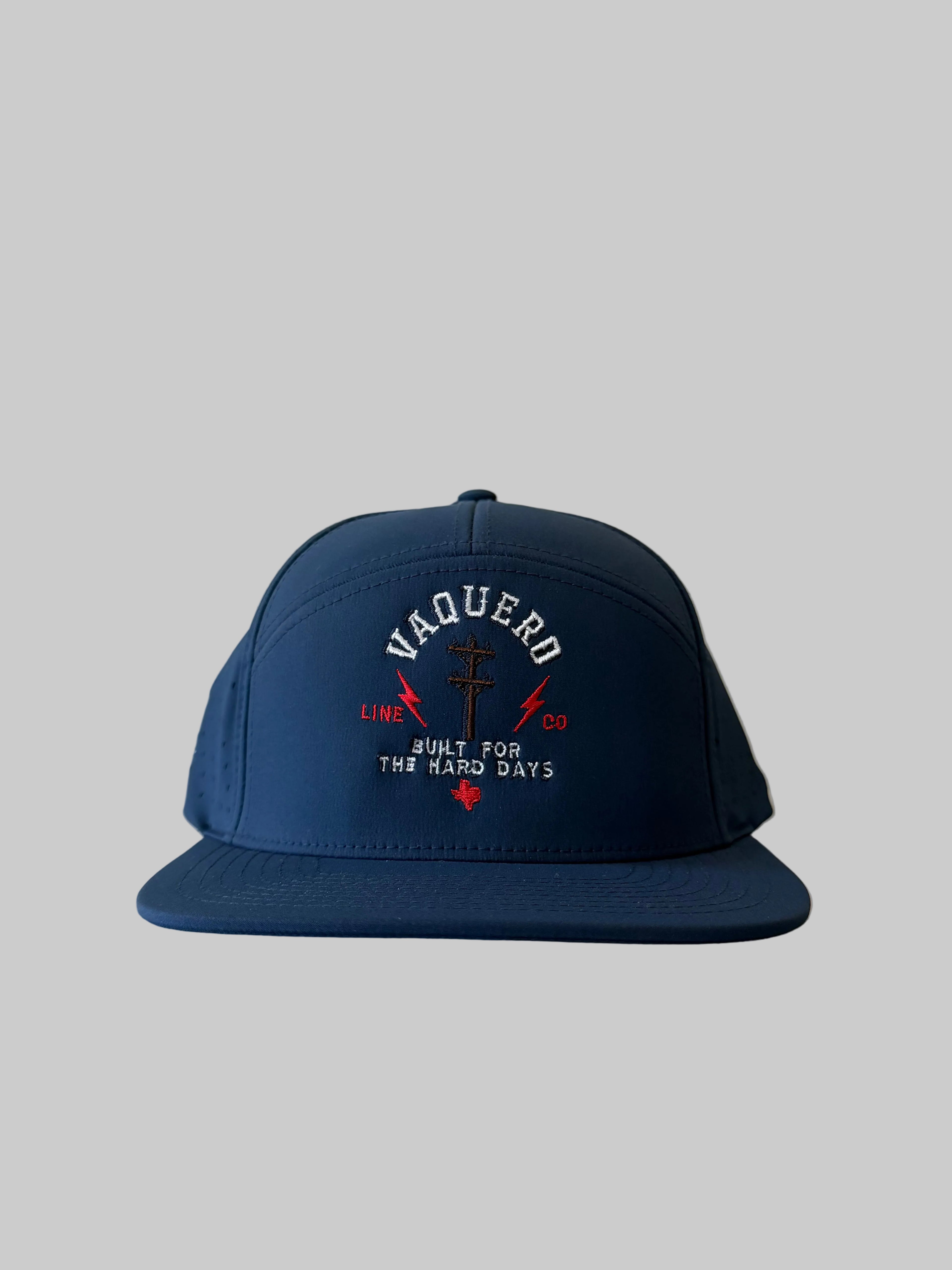 Navy blue cap with embroidered text on a blank background